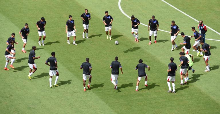 Costa Rica's players warm up prior to a Group D football match between Italy and Costa Rica at the Pernambuco Arena in Recife during the 2014 FIFA World Cup on June 20, 2014.     AFP PHOTO / JAVIER SORIANO        (Photo credit should read JAVIER SORIANO/AFP via Getty Images)