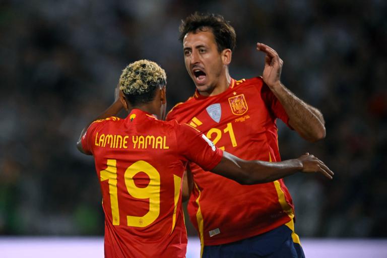 Spain's forward #21 Mikel Oyarzabal celebrates after scoring a goal of the match with Spain's forward #19 Lamine Yamal during the FIFA World Cup 2026 Group E European qualification football matches between Bulgaria and Spain, at the Vassil Levski stadium in Sofia on September 4, 2025. (Photo by Nikolay DOYCHINOV / AFP) (Photo by NIKOLAY DOYCHINOV/AFP via Getty Images)          