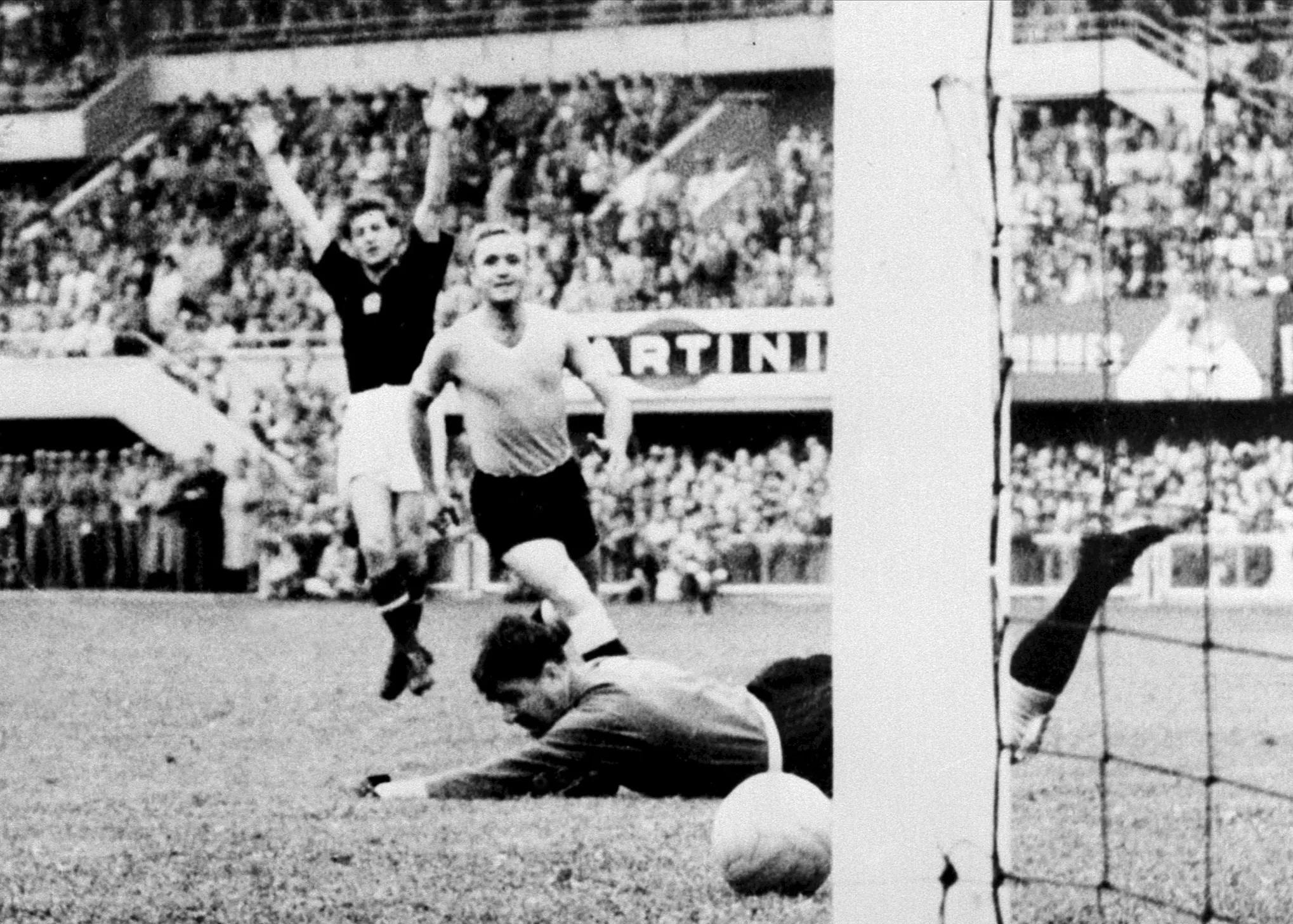 Hungarian forward Sandor Kocsis (L) celebrates as the ball rolls past Uruguayan goalkeeper Gaston Roque Maspoli into the net for a goal as defender Jose Santamaria looks on 30 June 1954 in Lausanne during the World Cup semifinal match between Hungary and Uruguay. Hungary advanced to the final with a 4-2 victory in extra time. AFP PHOTO (Photo credit should read STAFF/AFP via Getty Images)